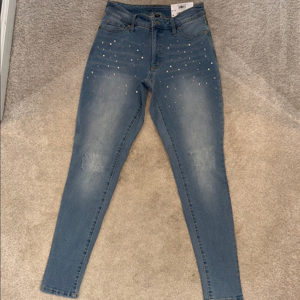 Blue Skinny Jeans with Rhinestone Embellishments and Distressing